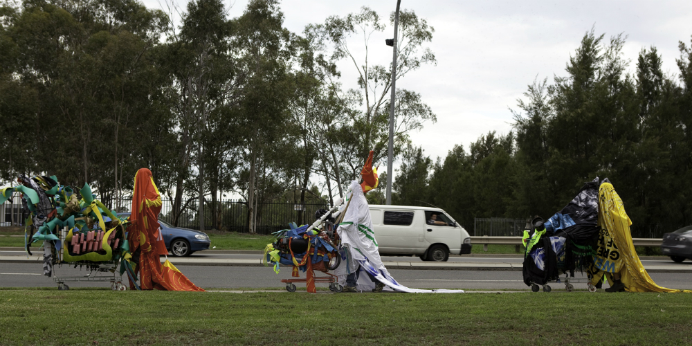 Ash Keating, Activate 2750, 2009. Procession 1, Mulgoa Road Superstore District, Penrith, 3rd March. Commissioned by C3West with SITA Environmental Solutions. Photograph: Alex Kershaw, © the artist. Image courtesy of the artist.